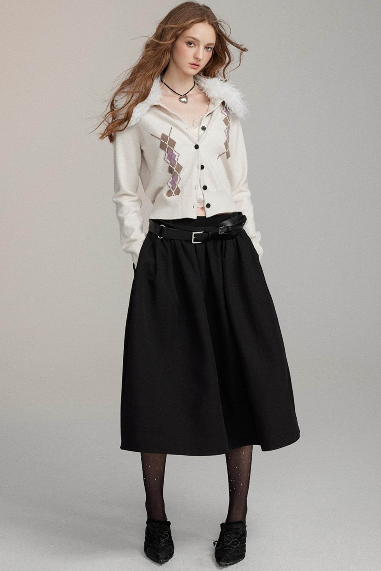 Veste en tricot matelassée avec col en fourrure