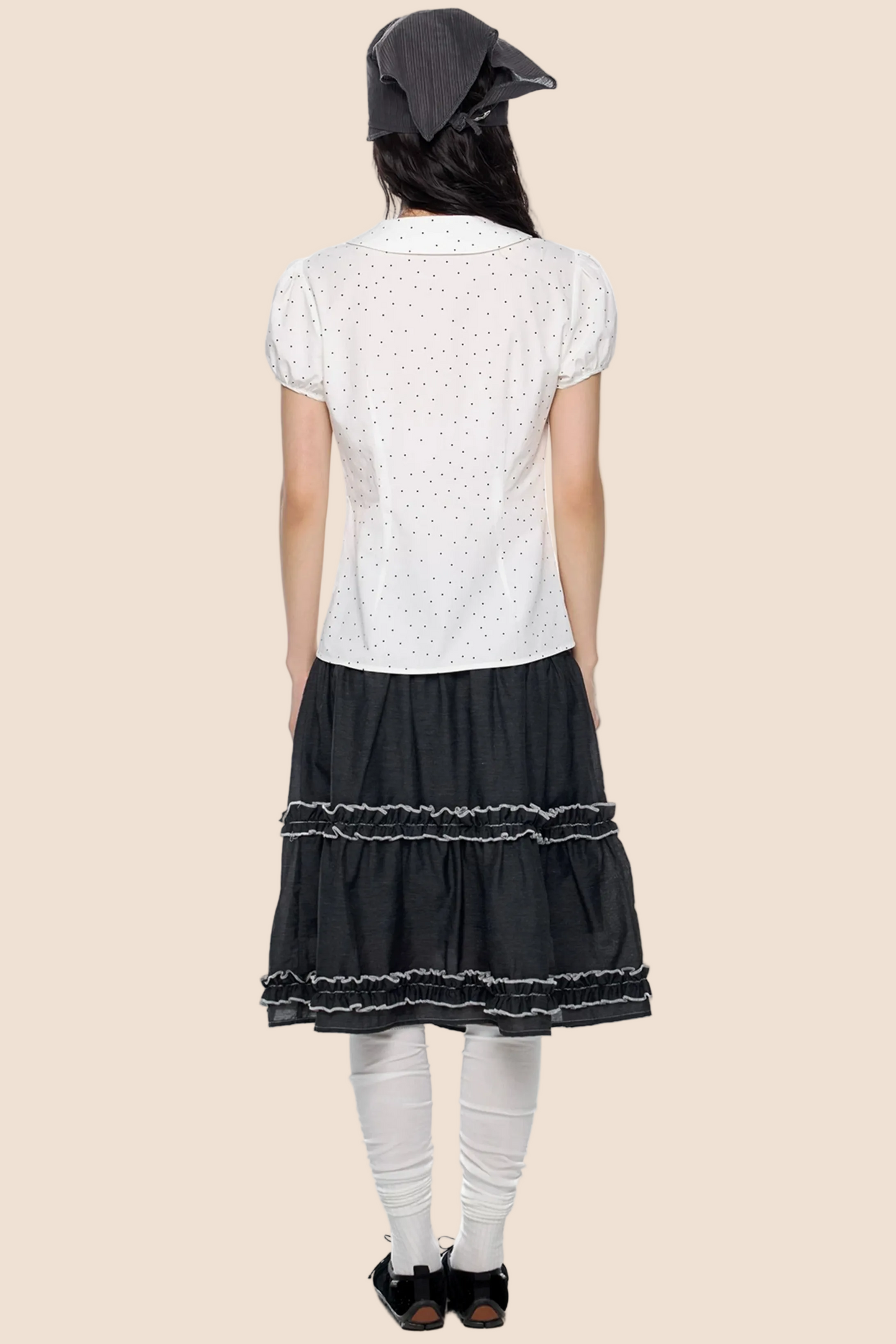 Blusa a pois con maniche a sbuffo