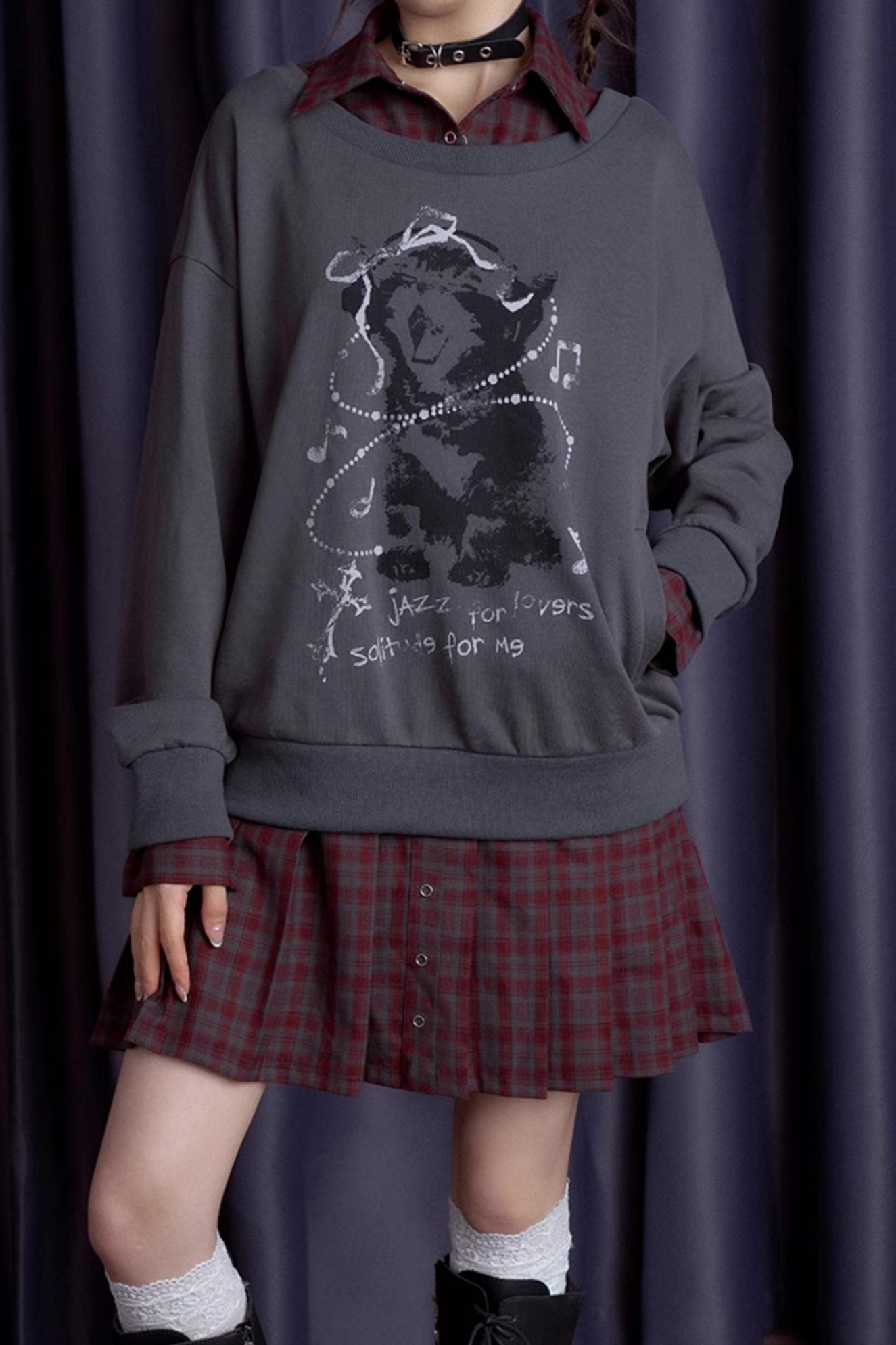 Robe en sweat à carreaux rouges