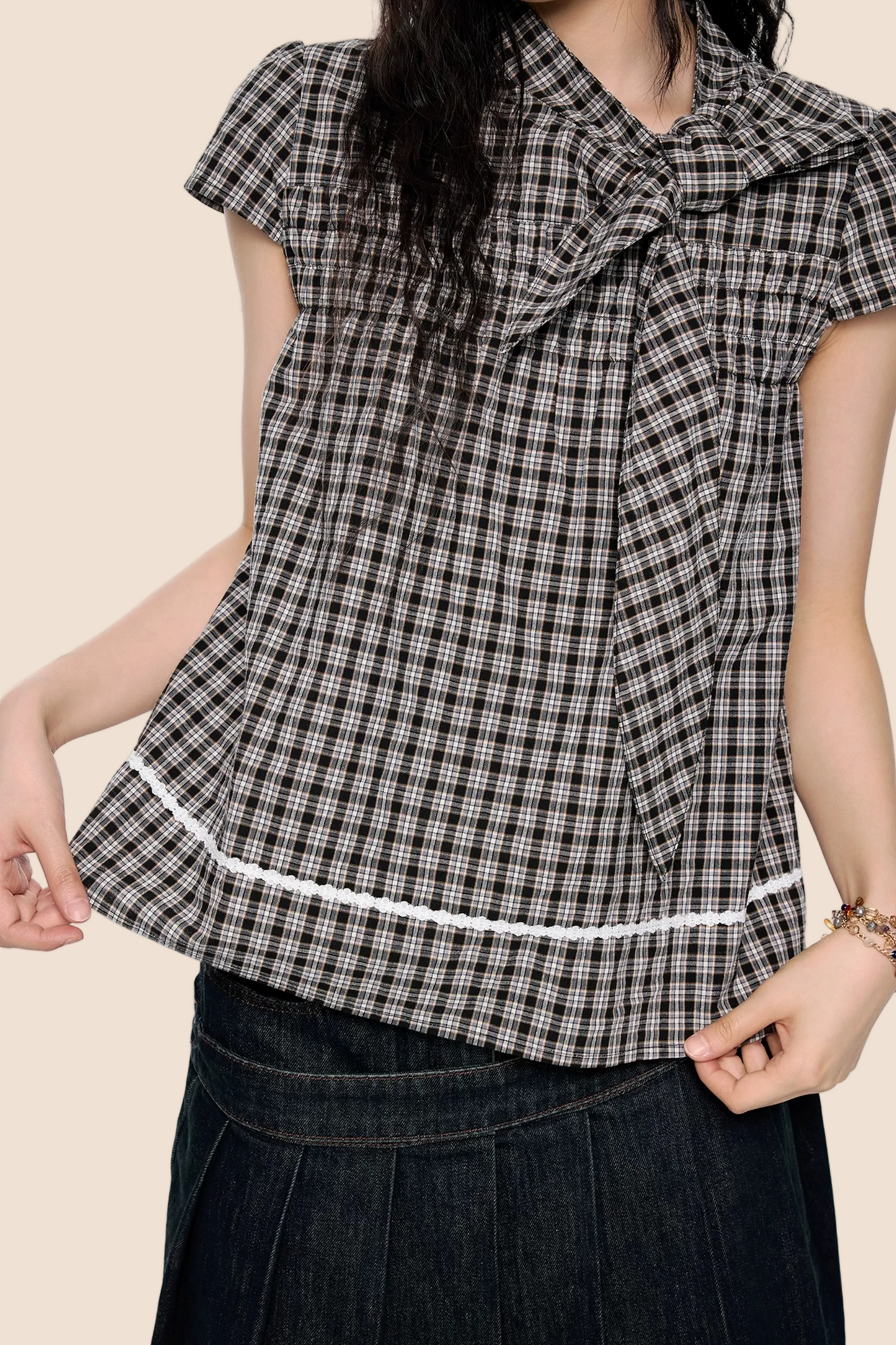 Top color-block con fiocco a quadri