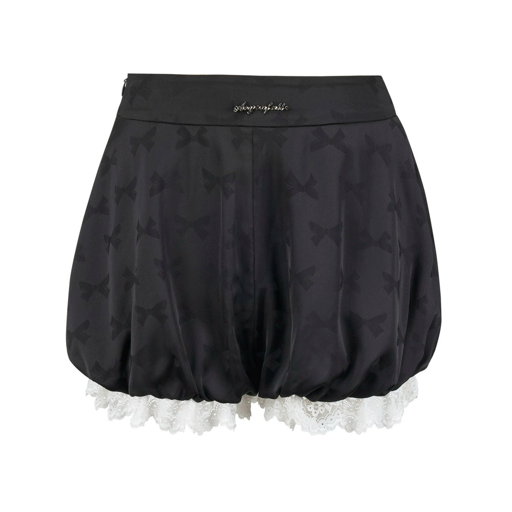 Pantalons en dentelle à détail papillon