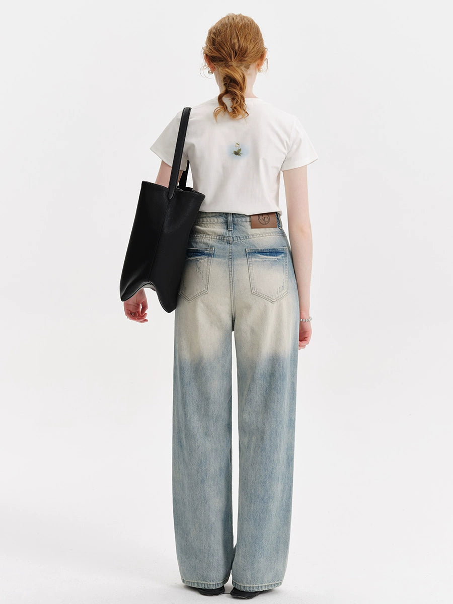 Pantalons en jean léger délavé et usé