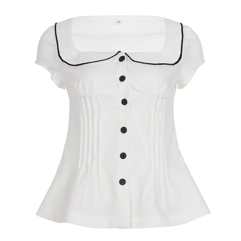 Blusa con cuello de muñeca con bloques de color