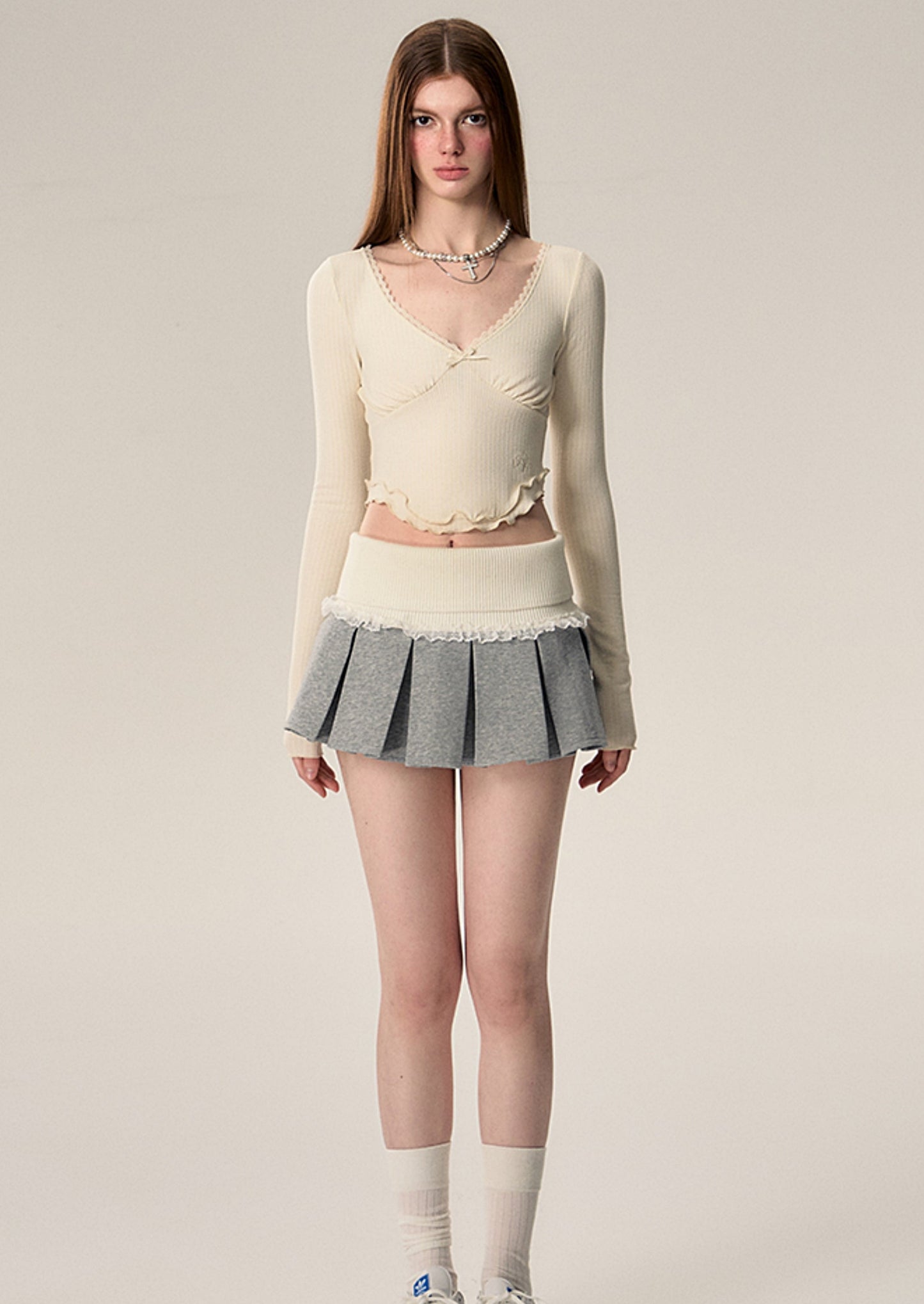 Hochtünchen gestrickte Spitzenspitzenfaltenrock