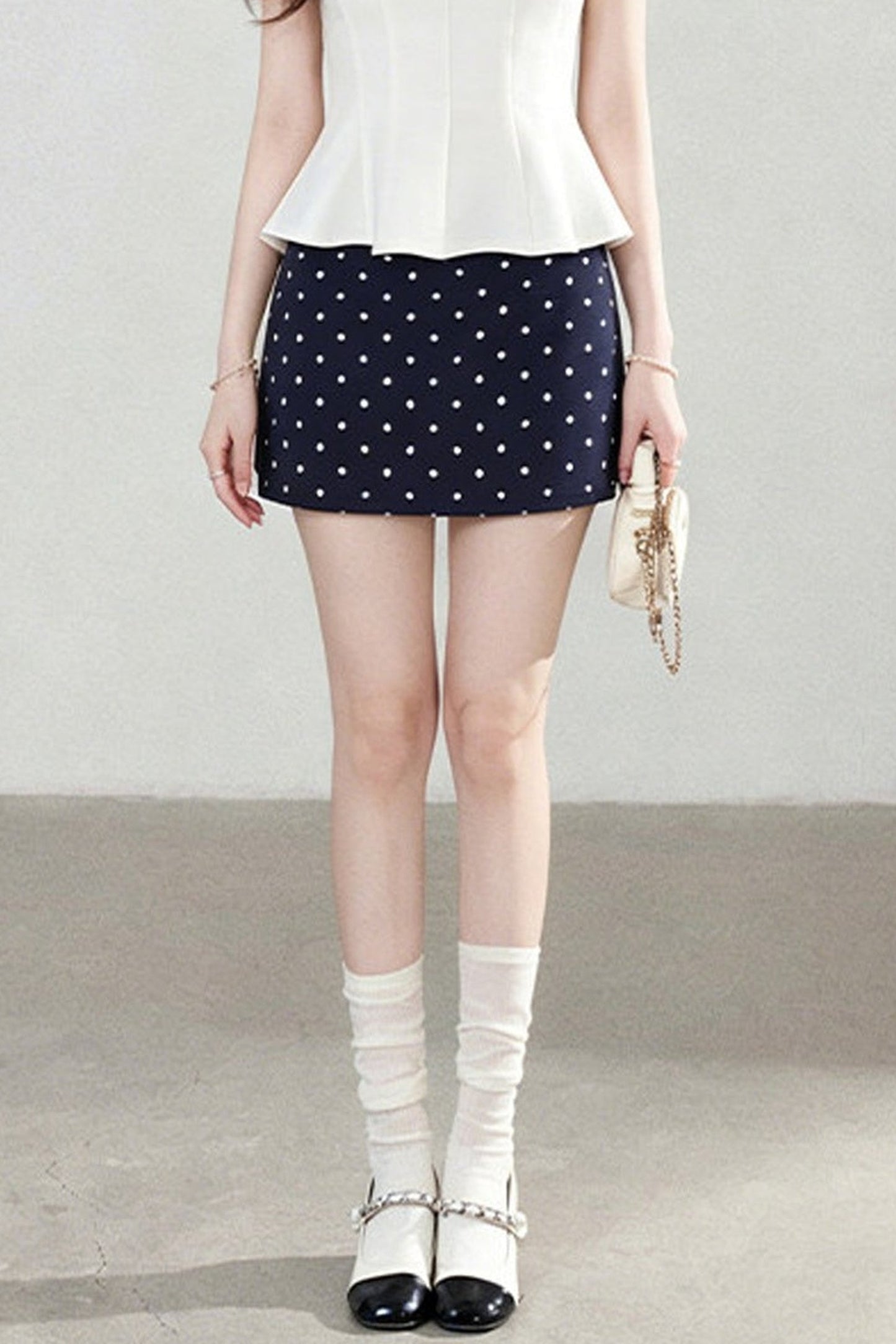 White Sleeveless Shirt and Polka Dot Skirt Set-Up