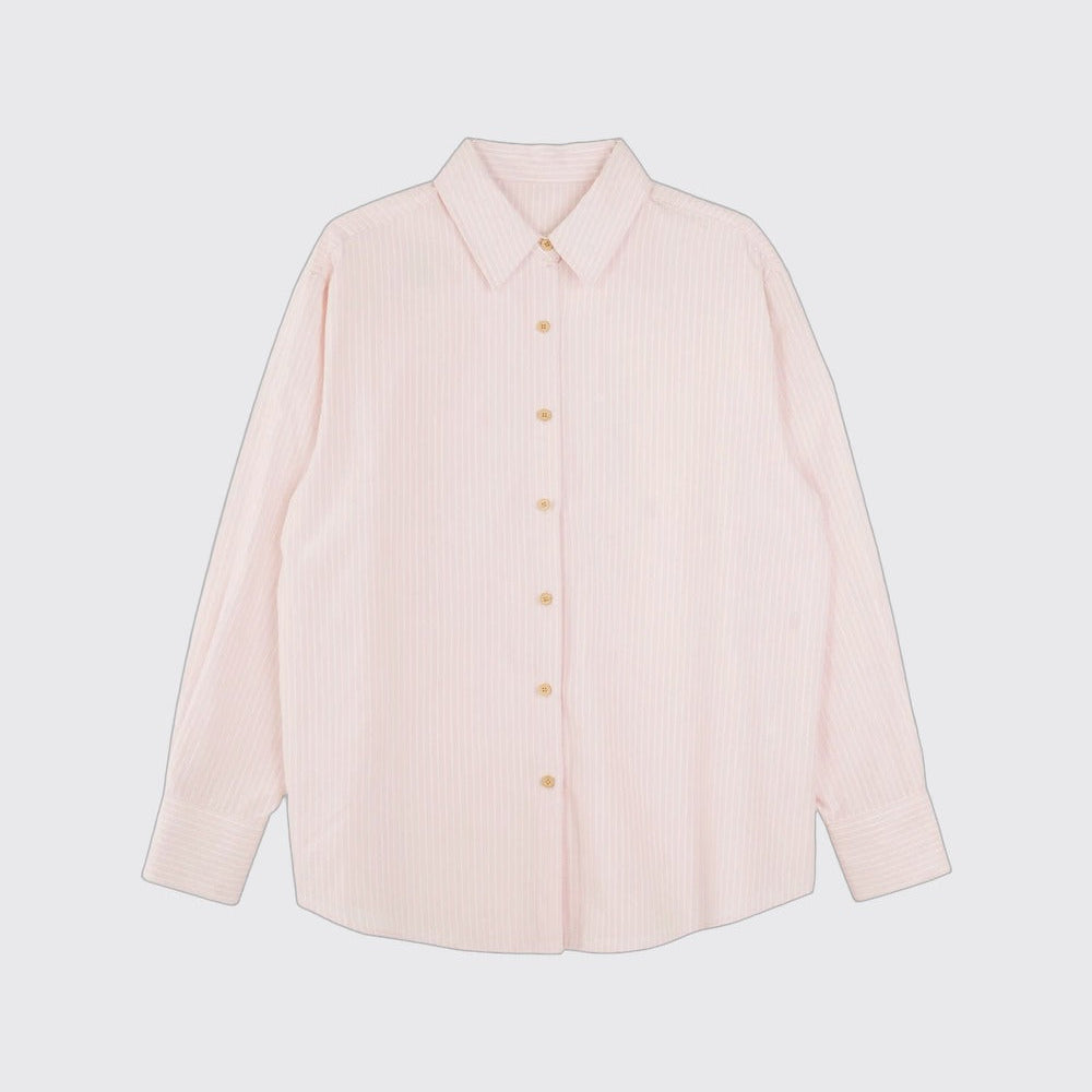 Blusa a rayas con textura y hombros caídos
