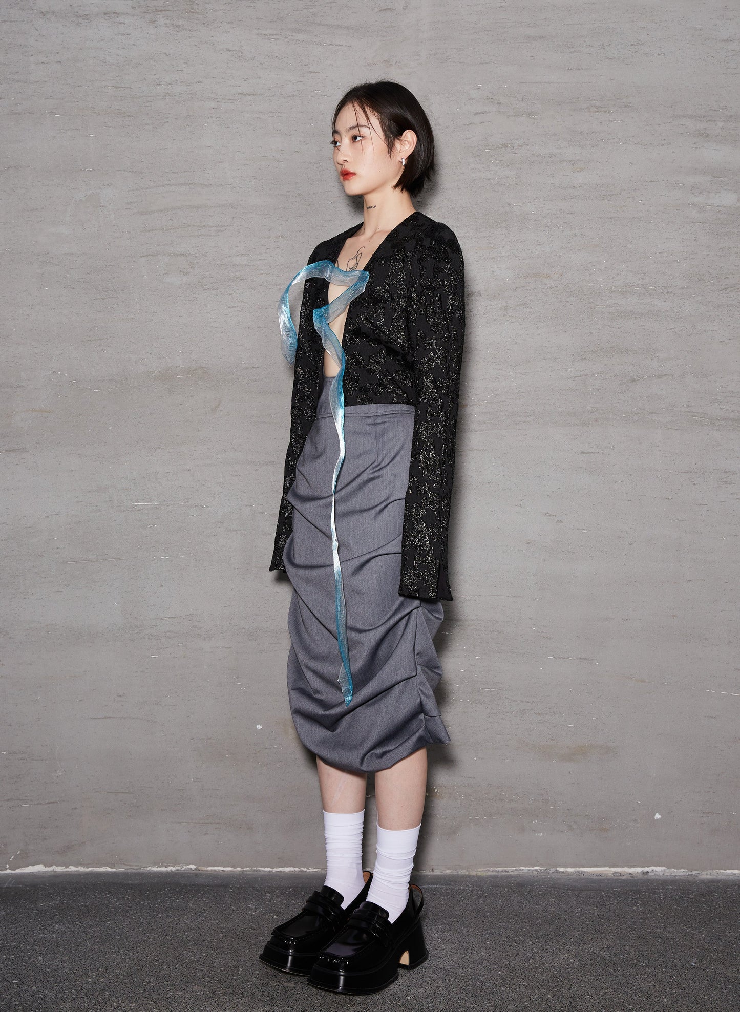 Jupe moulante taille haute à motif drapé