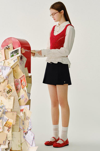 채워진 모찌 울 니트 조끼 