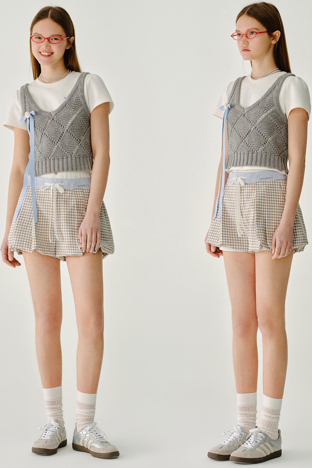 채워진 모찌 울 니트 조끼 