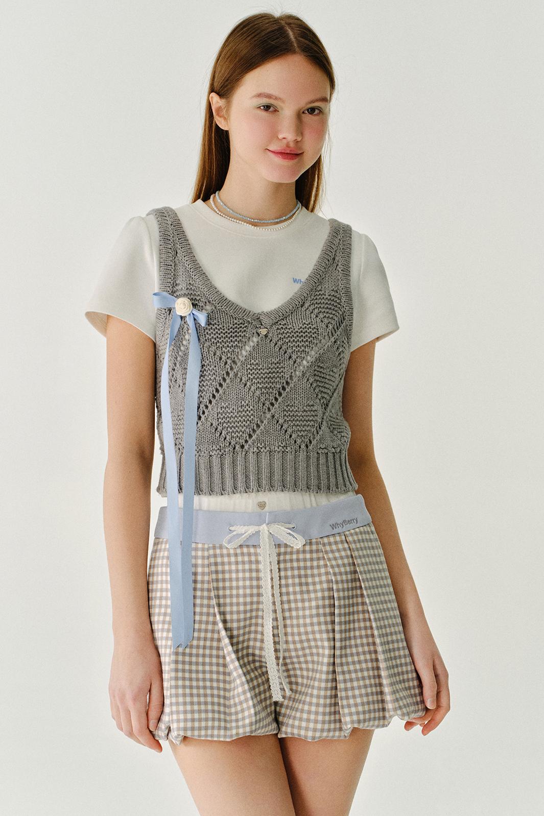 채워진 모찌 울 니트 조끼 