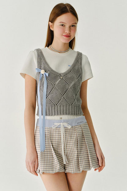 채워진 모찌 울 니트 조끼 