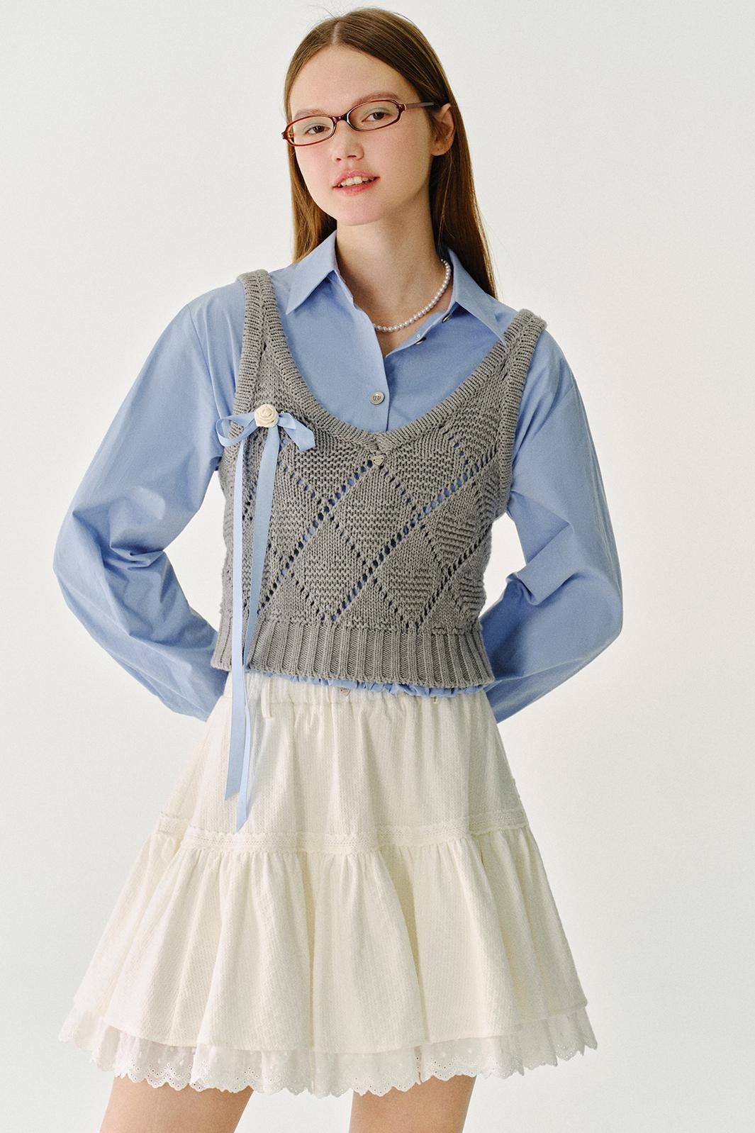 채워진 모찌 울 니트 조끼 