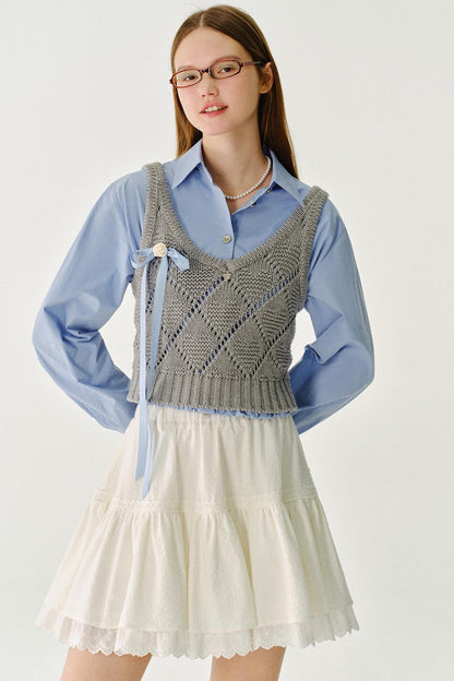 채워진 모찌 울 니트 조끼 