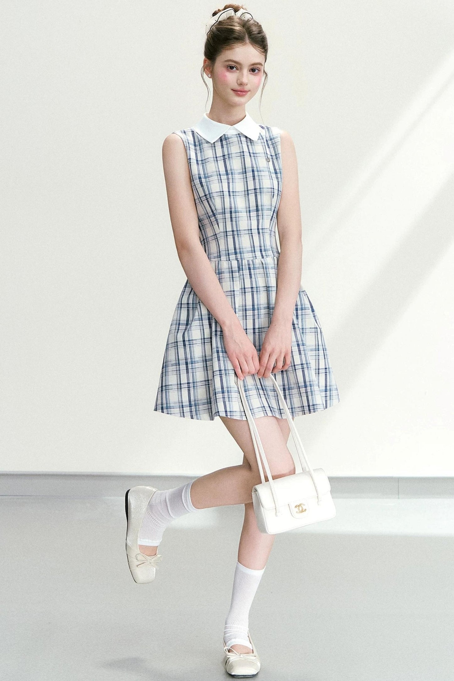 Abito elegante a quadri blu