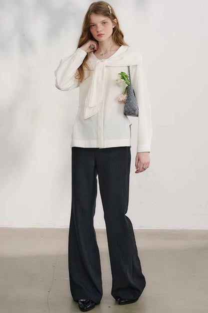 밤색 손으로 말아 올린 플레어 팬츠