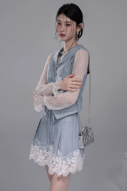 Set con gilet in pizzo color block