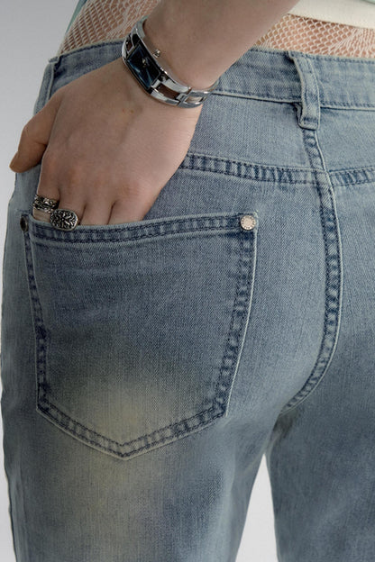 SMOKY WASHED ROPE FLARED JEANS