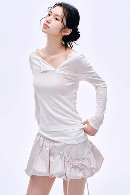 Blusa asimmetrica in misto lana