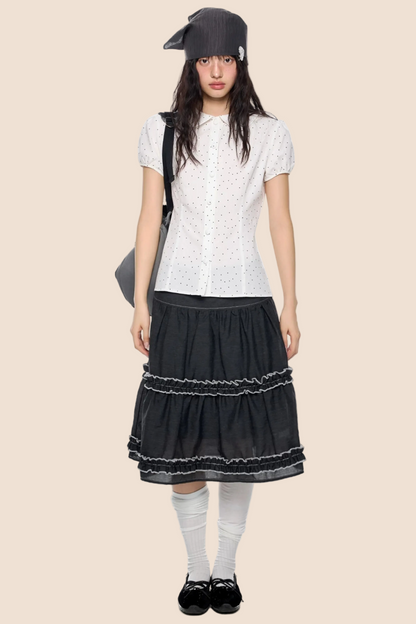 Blusa a pois con maniche a sbuffo