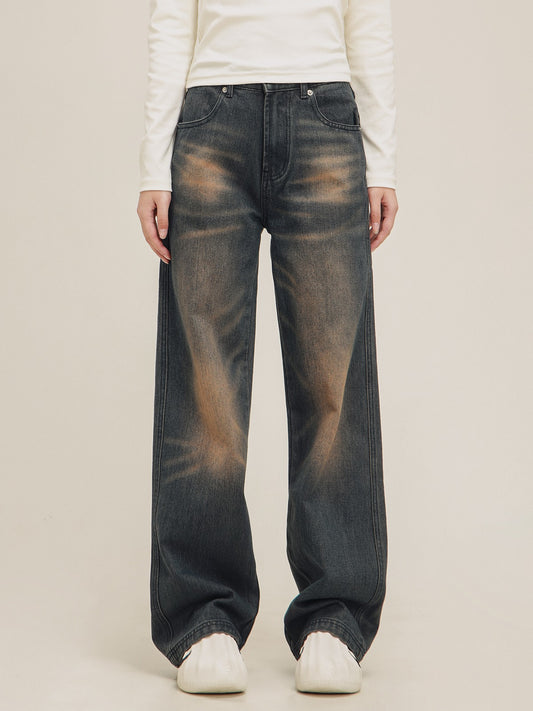 washed distressed draped jeans pants