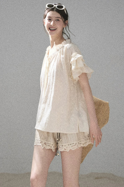 Bestickte V-Ausschnitt-Bluse