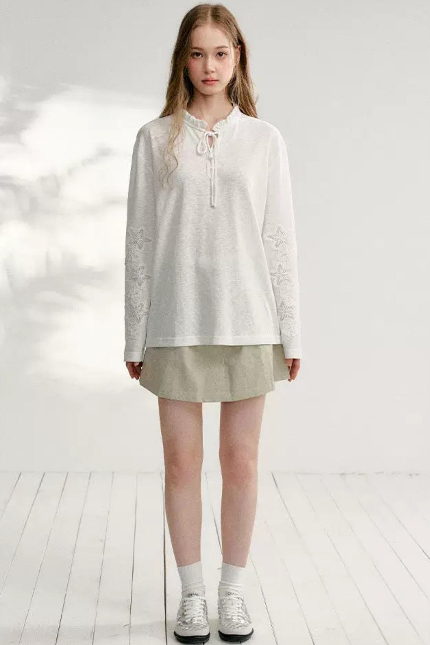 Hollow Floral Tie-Up Blouse
