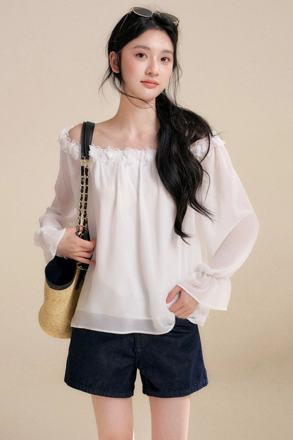 Blusa de gasa con flores tridimensionales