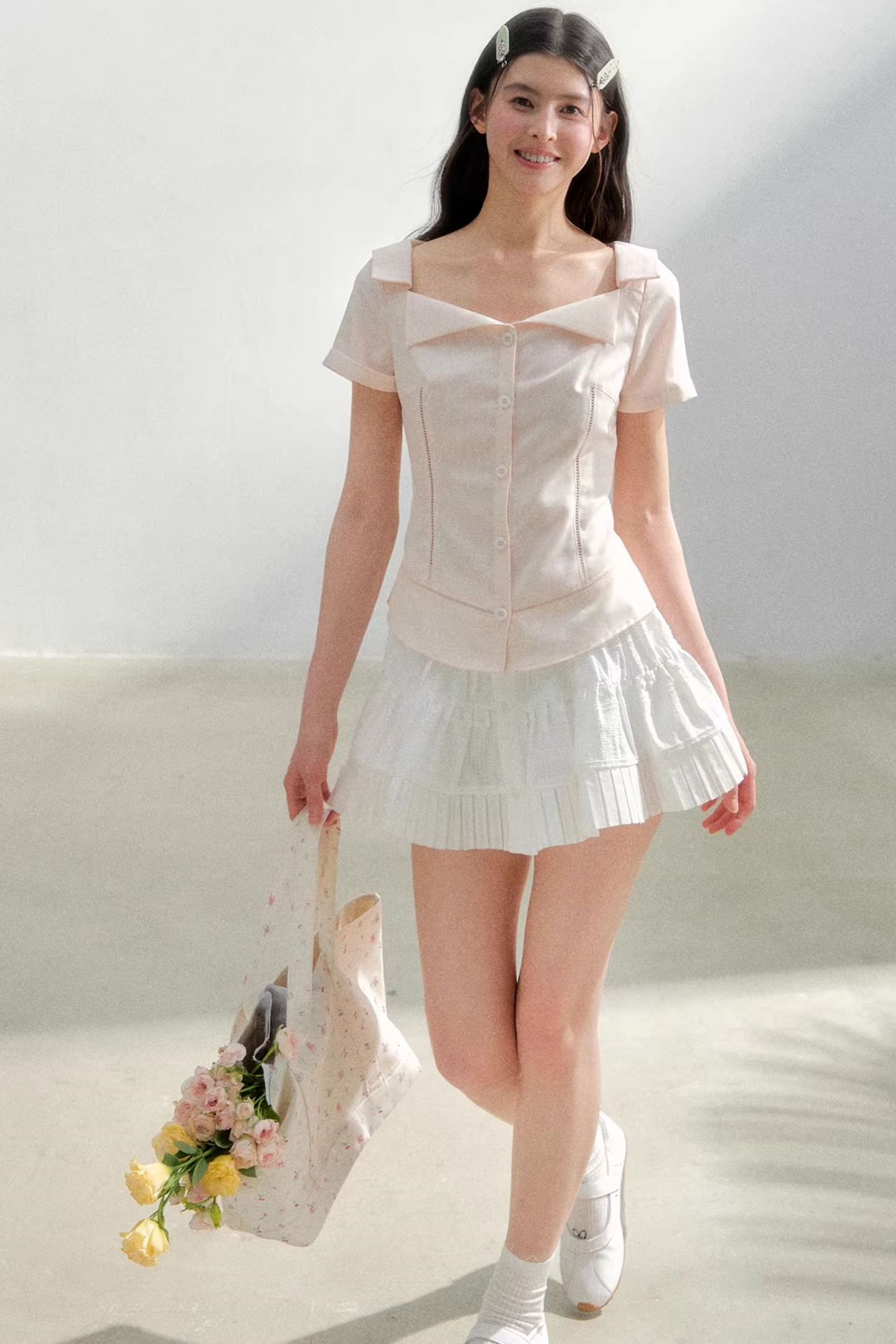 Blusa retrò rosa con risvolto
