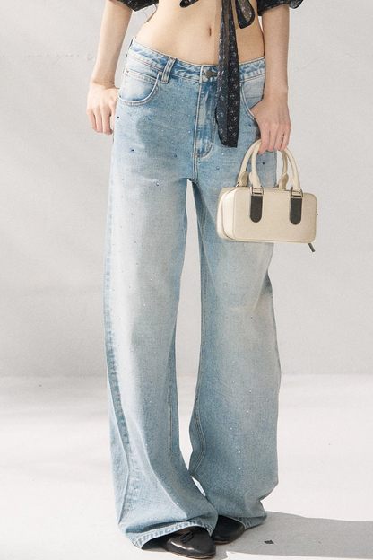 Pantaloni in denim blu a gamba dritta