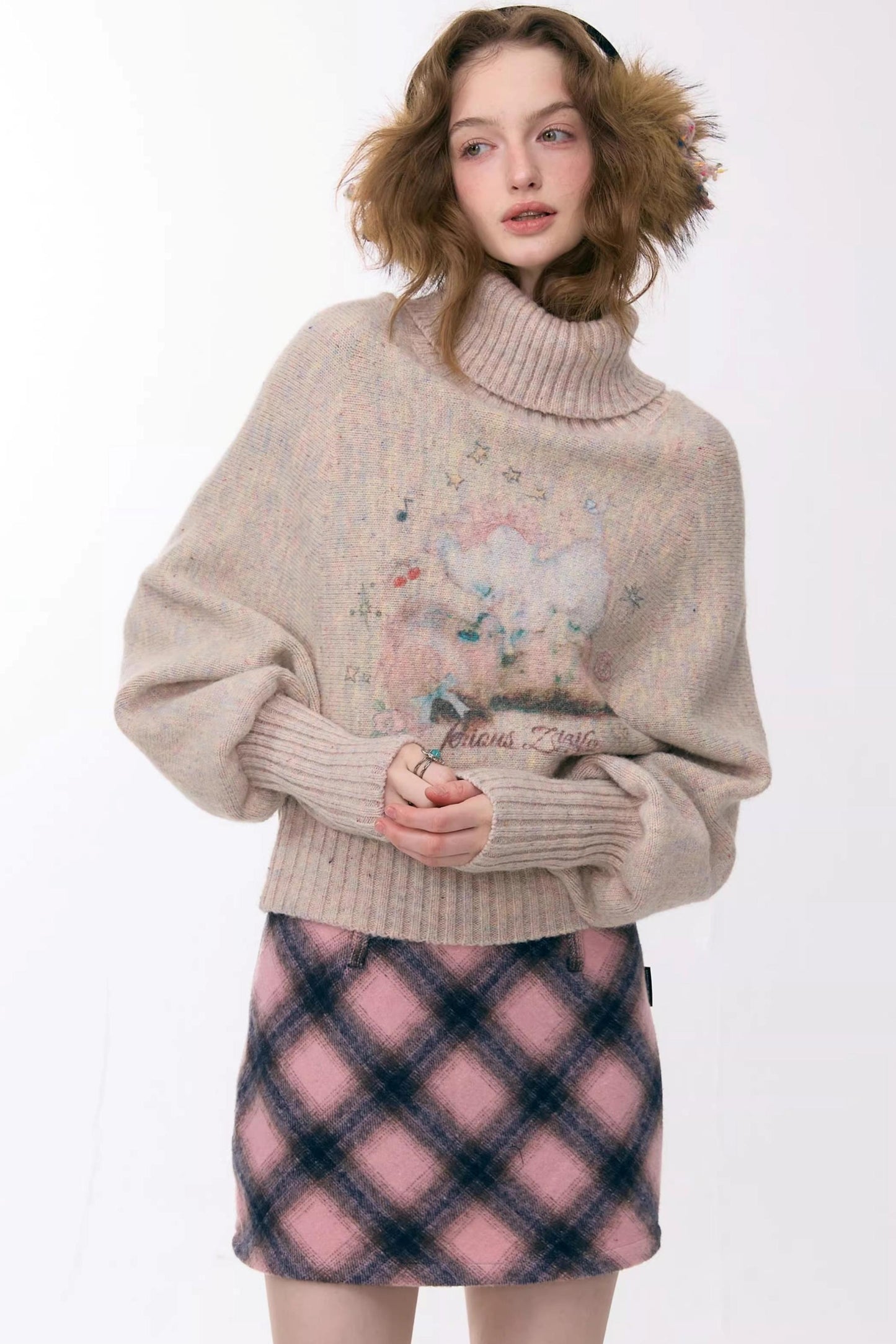 Aprikosenfarbener Fledermausärmelpullover mit hohem Kragen