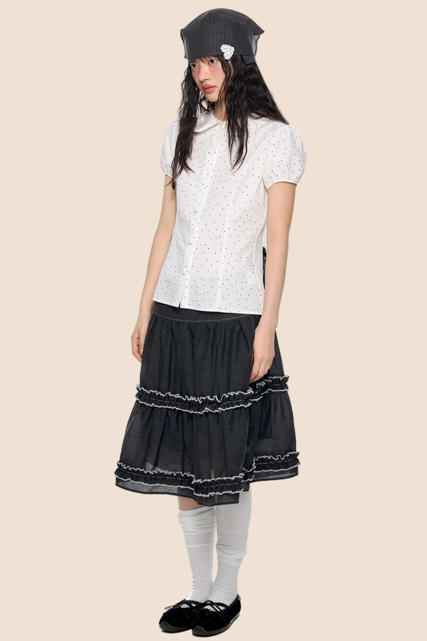 Blusa a pois con maniche a sbuffo