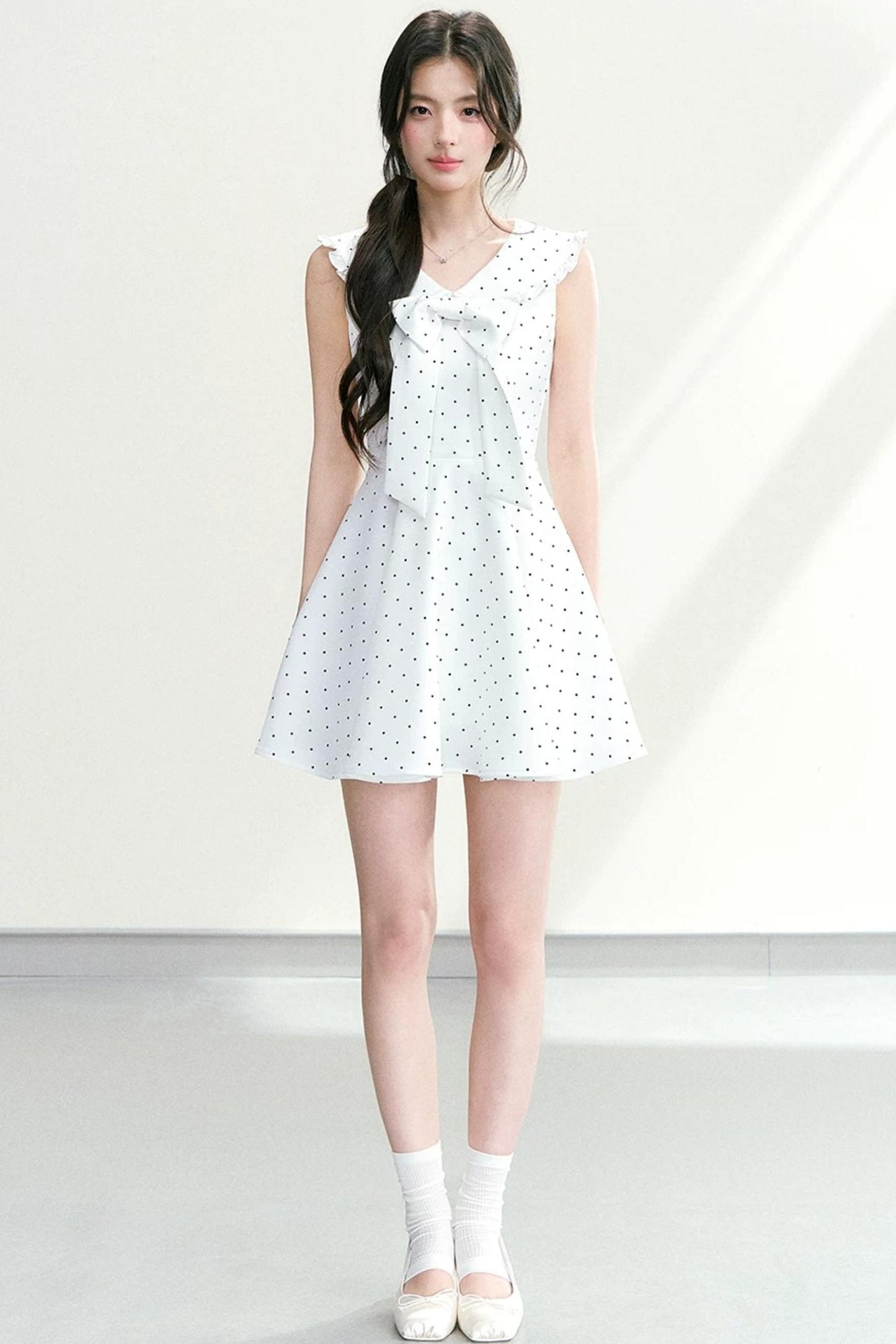 Vestido de lunares con cuello de lazo