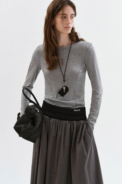 Haut polyvalent à manches longues et coupe slim