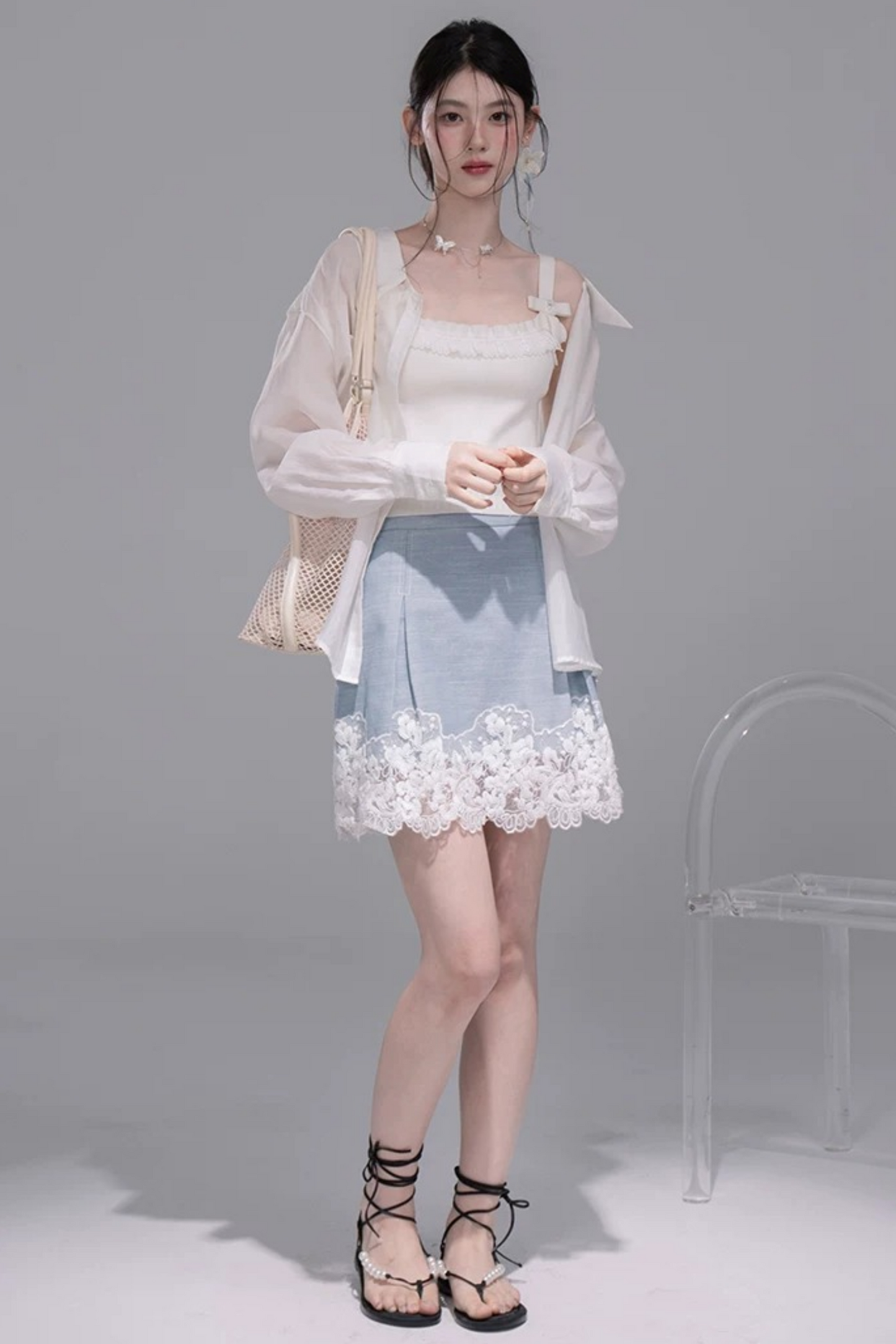 Set con gilet in pizzo color block