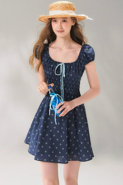 Abito floreale blu navy con lacci
