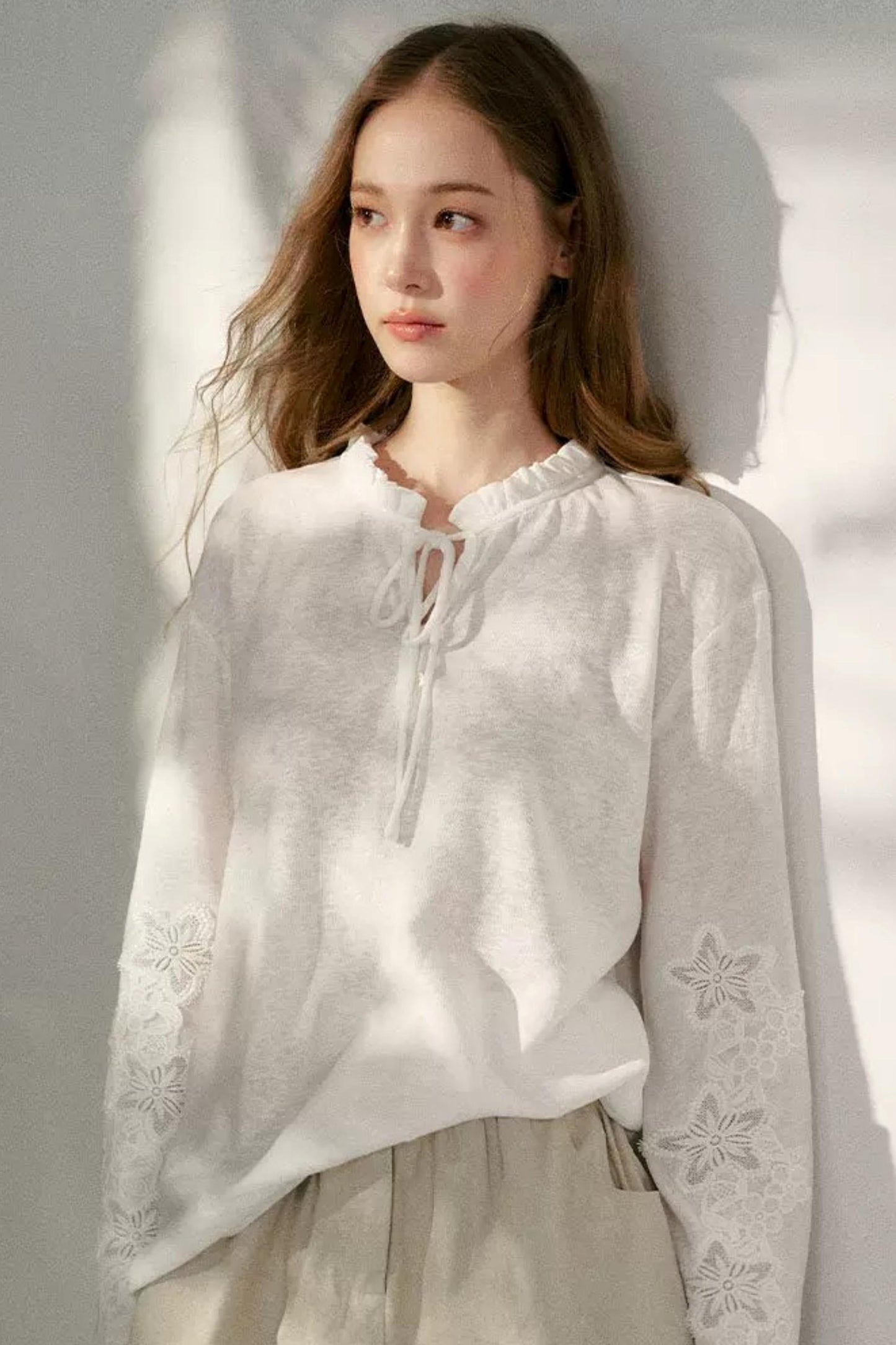 Hollow Floral Tie-Up Blouse