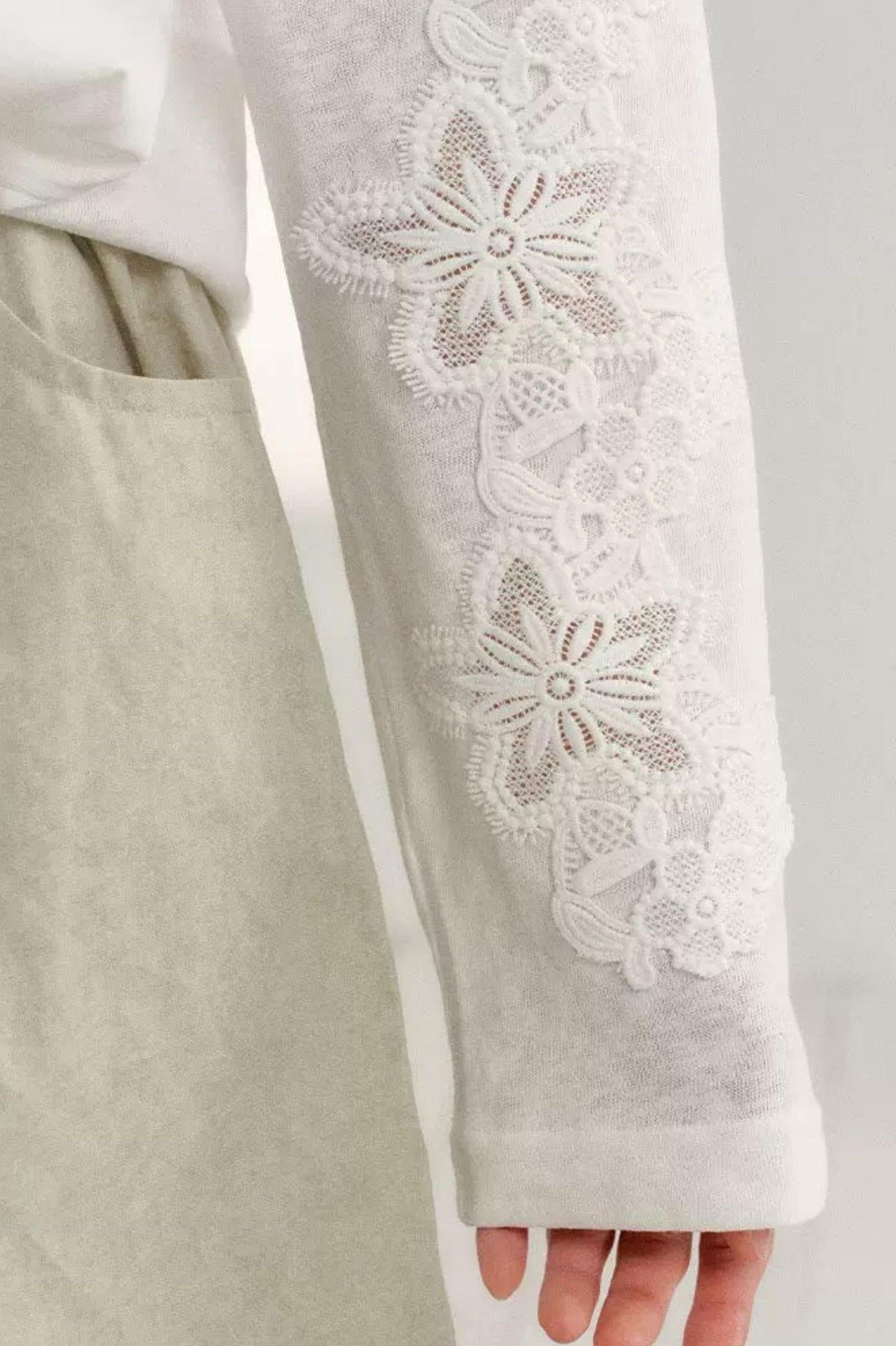 Hollow Floral Tie-Up Blouse
