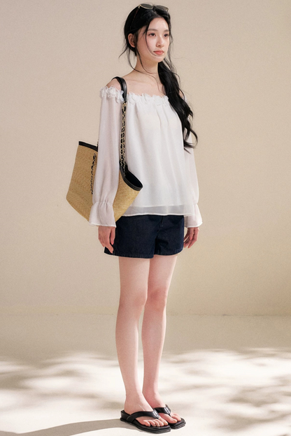 Blusa de gasa con flores tridimensionales