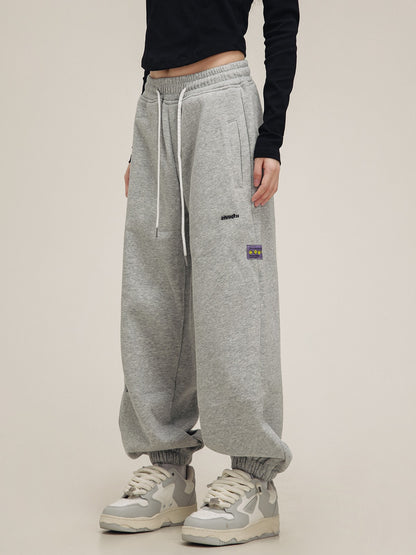 American label embroidered sweat pants