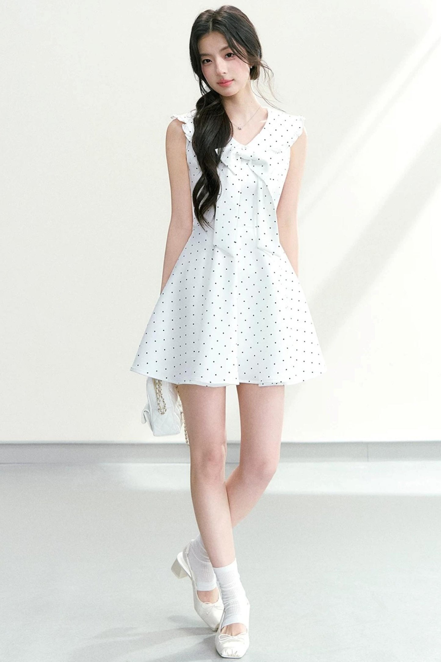 Vestido de lunares con cuello de lazo
