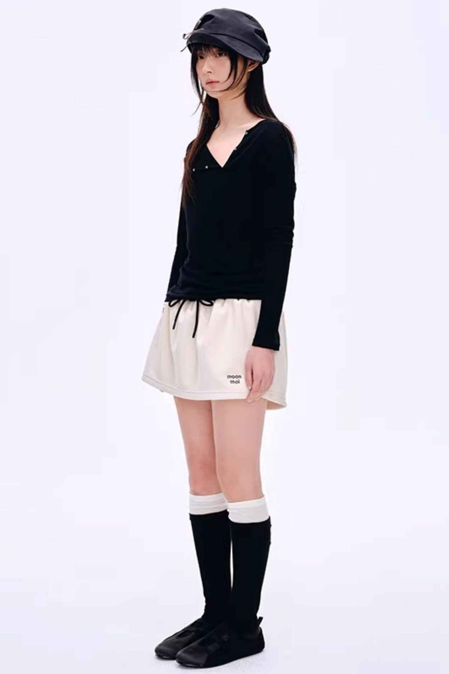 Blusa asimmetrica in misto lana