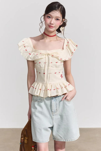 Blusa francese a fiori con volant