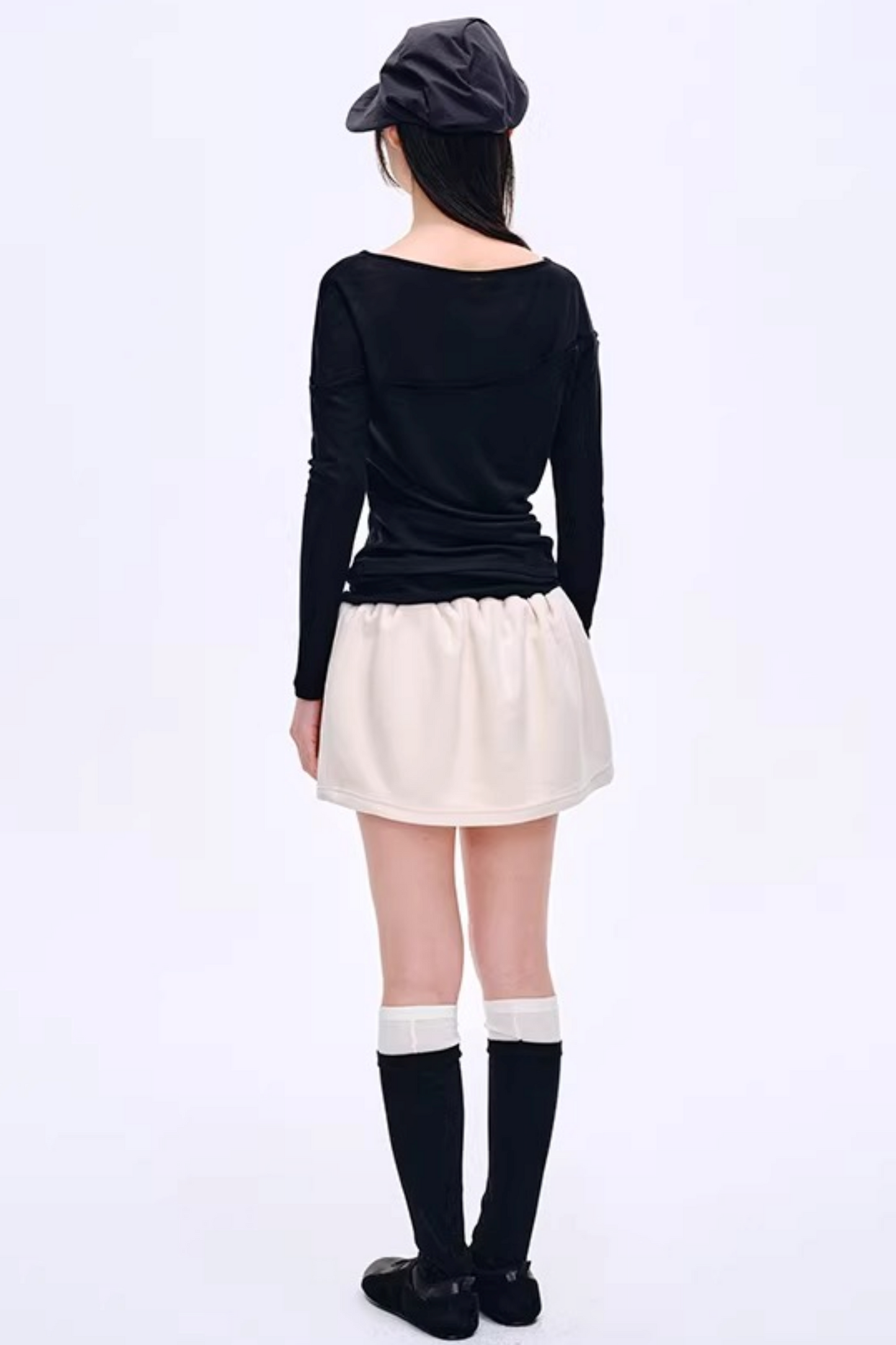 Blusa asimmetrica in misto lana