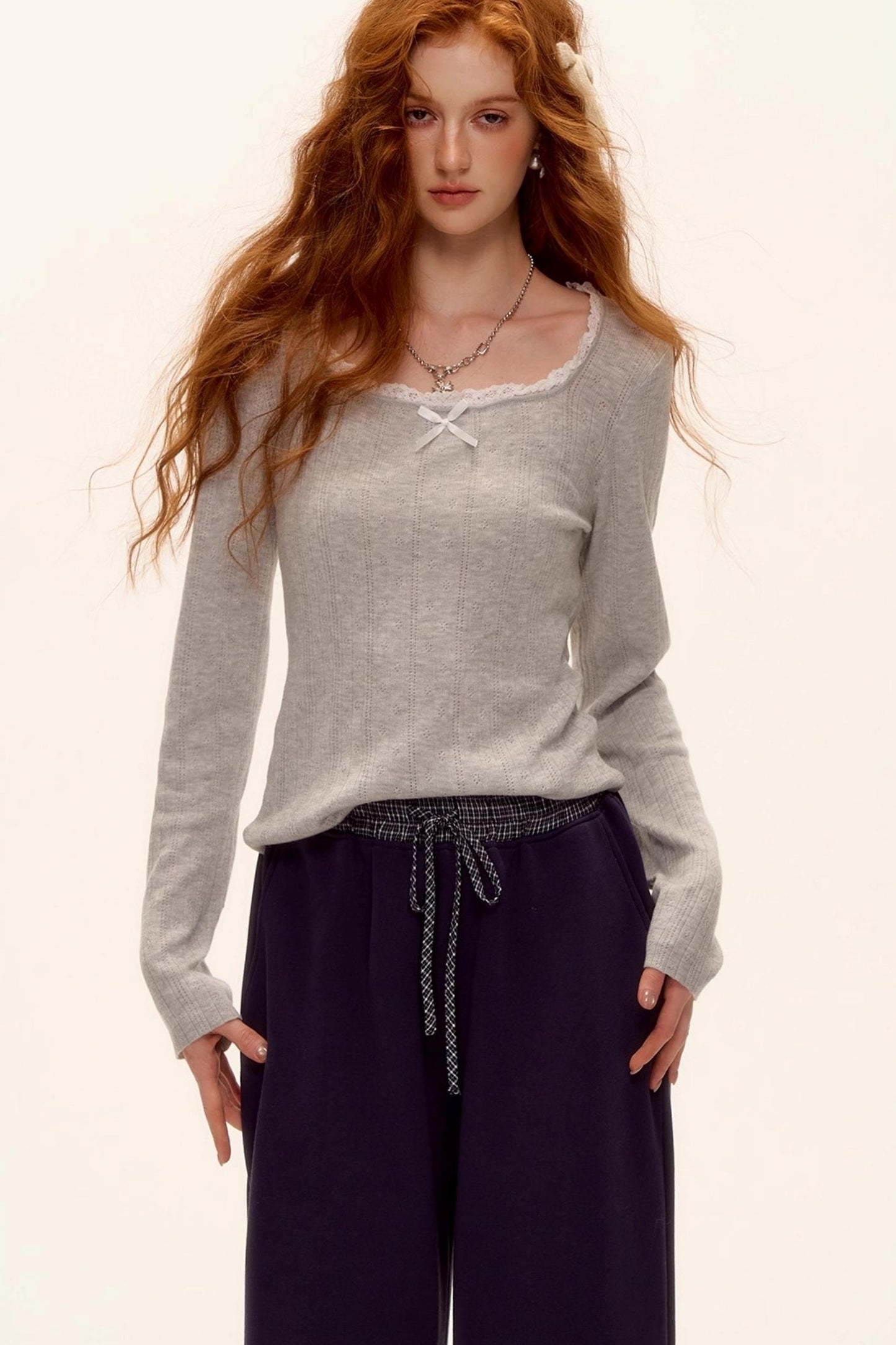 Lace-Trimmed Bow Hollow Knit Top