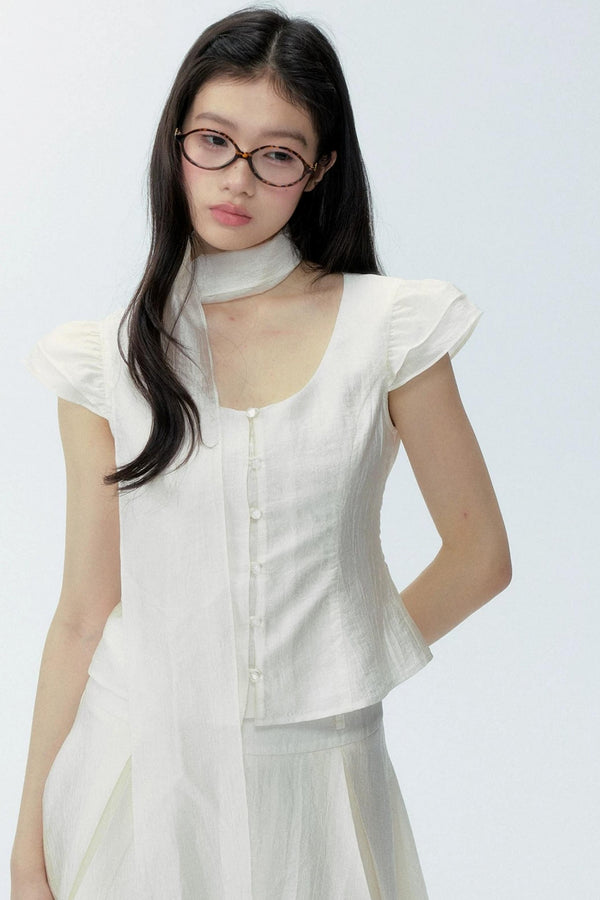 Conjunto de top de manga con vuelo para principios de verano