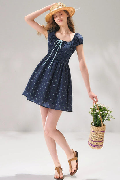 Abito floreale blu navy con lacci