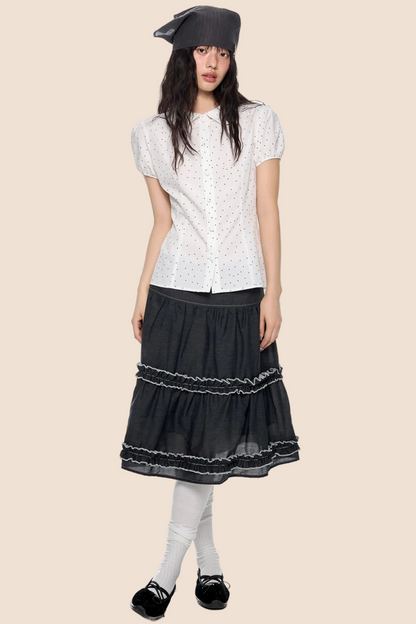 Blusa a pois con maniche a sbuffo