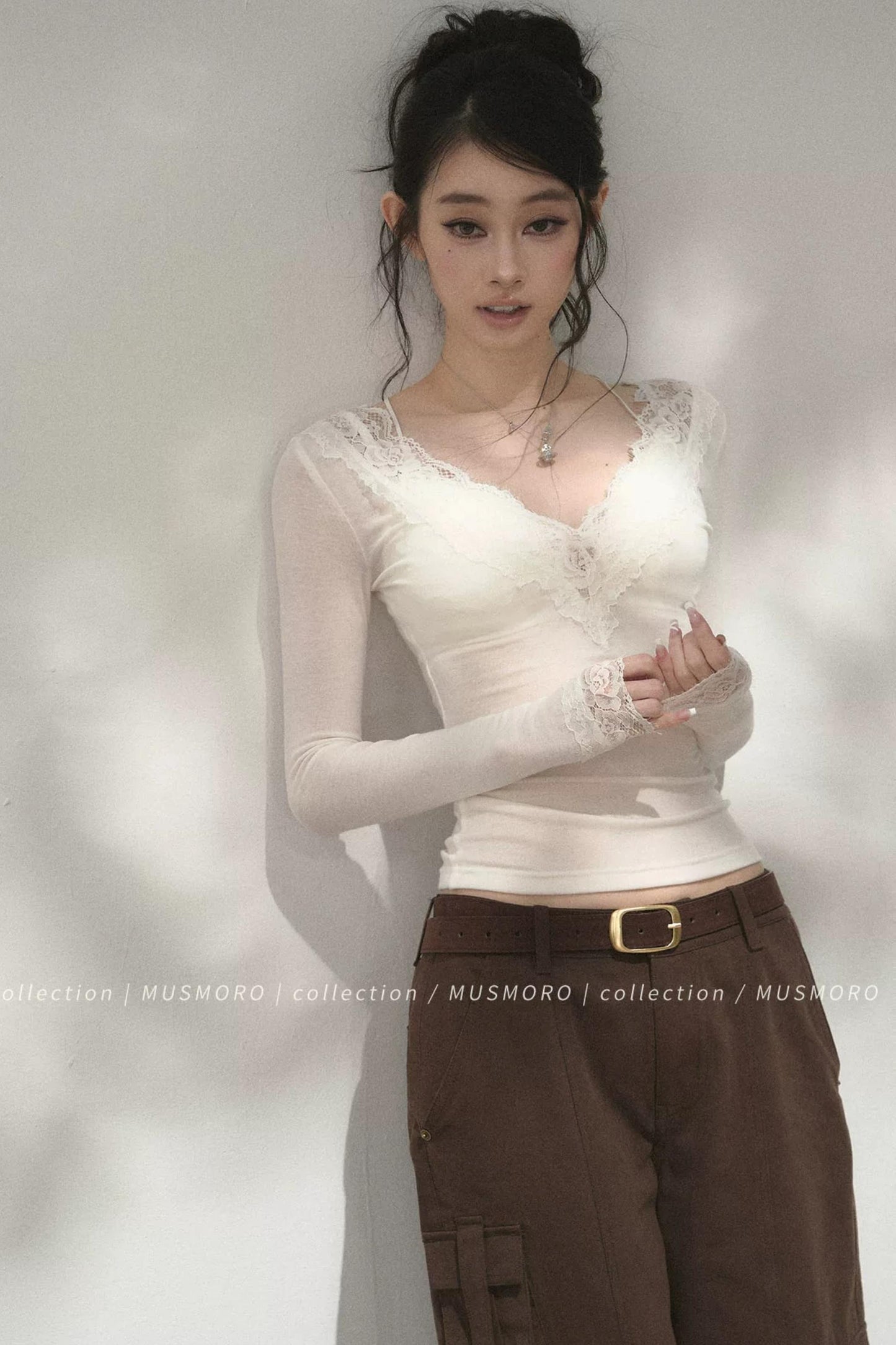 Top in maglia di pizzo a toppe