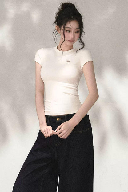 Top in maglia traforata ricamata