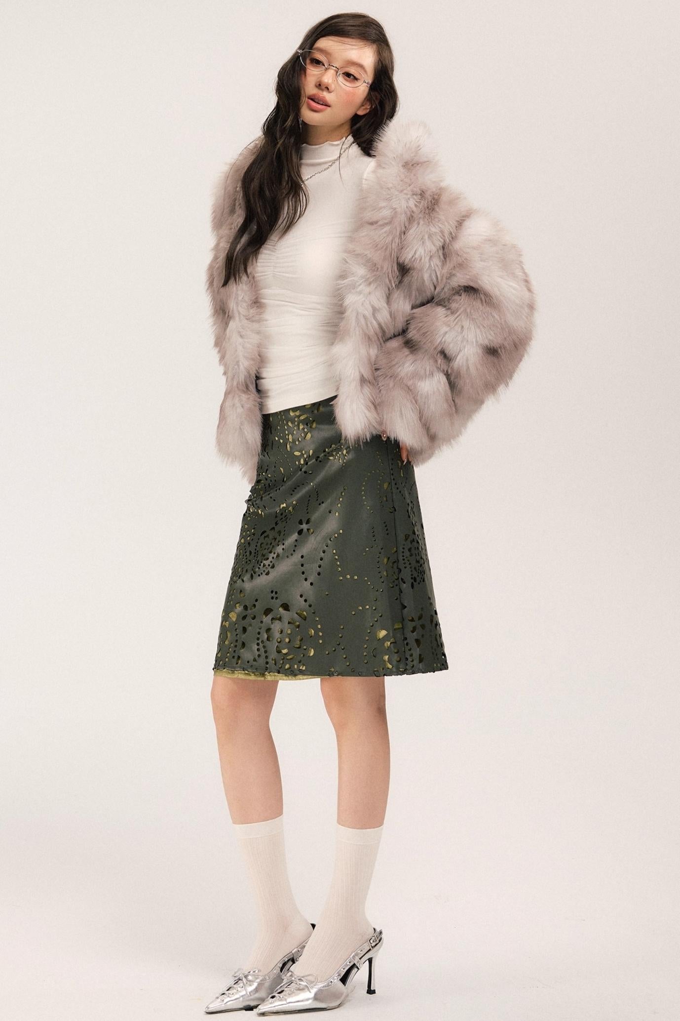 Sassy Vintage Cutout Leather Skirt